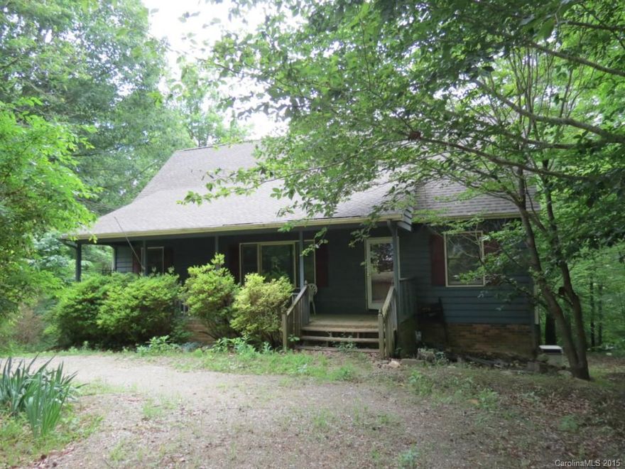 Handyman Special that is PRICED RIGHT! This 4 BR/3BA home sits on a private 16 acre wooded lot w/creek, a 30x60 garage/workshop and has easy access to Hwy 5 and I-85! The interior of the home needs cosmetic improvements throughout, but once completed will make a fantastic 4BR home with an office, dining room and walk-out basement. Fireplace is located in the family-room and basement, and the master BR/BA is located on first floor. Large deck off the back of the home with a covered patio below.