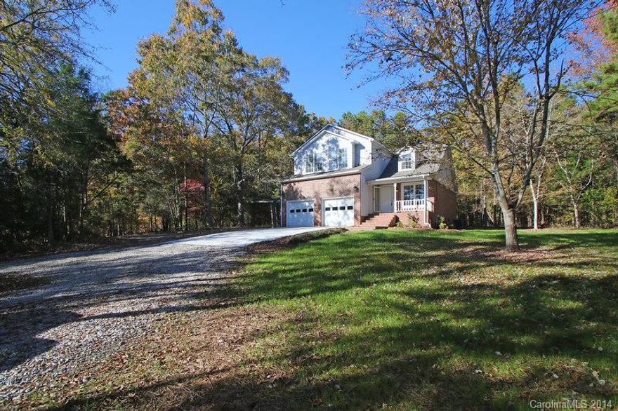 Wow, totally redone and almost 2.5 acres! New architectural shingle roof, 2 new HVAC systems, new large concrete parking pad off garage, large deck for entertaining. Main level boasts new bamboo floors, new carpet upstairs, new granite and stainless steel appliances in kitchen and cabinets have rollouts. Master bath has new granite tops with dual sinks, new tile and fixtures along with a separate shower, jetted tub and walk in closet.
All bedrooms are nice sized. 4th bedroom/bonus/media room.