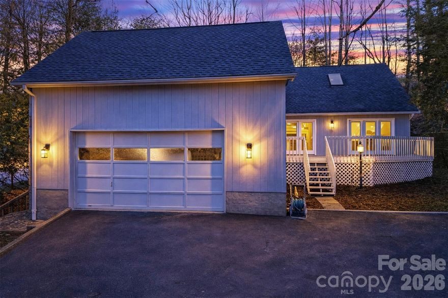 Location, Location, Location! Just steps from the clubhouse and many of the incredible amenities that Connestee Falls has to offer. This beautifully updated 3-bedroom, 3-bath home features soaring vaulted ceilings and stunning original wood floors that add warmth and character throughout. Recent upgrades include fresh Sherwin-Williams paint throughout, new carpet and padding in the bedrooms and upstairs, and new tile flooring in all bathrooms and the laundry room (with attic stock available). Popcorn ceilings have been removed and professionally refinished for a clean, modern look. The fully updated kitchen features new cabinetry, quartz countertops, and a new LG appliance package, while all three bathrooms have been renovated with new cabinetry, countertops, plumbing fixtures, and lighting. Additional improvements include new light fixtures throughout, updated electrical devices including GFI outlets, new interior and exterior door hardware, and oversized patio doors leading to the rear deck. A new treated retaining wall adds durability and curb appeal. 
Upstairs offers a private bedroom suite with full bath and closet, ideal for guests or additional privacy. 
Connestee Falls is a 4,000-acre gated mountain community offering an 18-hole championship golf course, four pristine mountain lakes, more than 20 miles of private hiking trails with waterfalls, pickleball and tennis courts, bocce ball, and a community swimming pool. A one-time Connestee Falls user amenity fee of $14,500 is due at closing for new buyers to the community, or $16,000 if paid by the end of the calendar year of purchase.