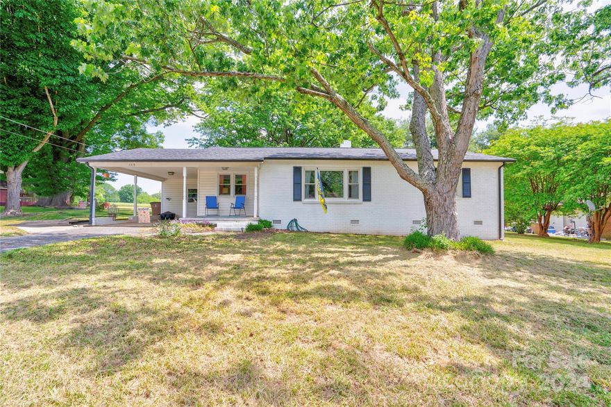 Discover this adorable brick ranch nestled in a highly desirable Shelby neighborhood, conveniently located near downtown, parks, gyms, and restaurants. As you step inside, you'll be drawn to the cozy atmosphere and the natural light flooding through the large windows. The layout offers an open feel, with the dining area seamlessly flowing into the living room. While the home has been updated with modern amenities, it still retains its original charm. The kitchen features lovely backsplash and countertops. Outside, you'll find a spacious lot with level ground, a single-car carport, and extra parking space. The sellers are even throwing in a stackable washer, dryer, and fridge. Don't miss out on the chance to visit this charming home today!