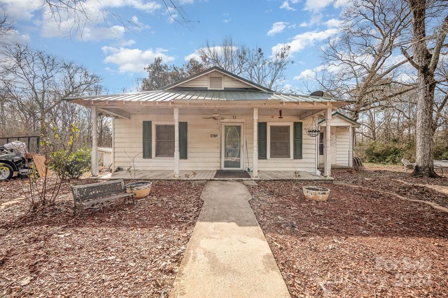Welcome to this cute and cozy 2 bedroom, 1 bath home with a living room and family room with a back deck all on more than 4 acres.