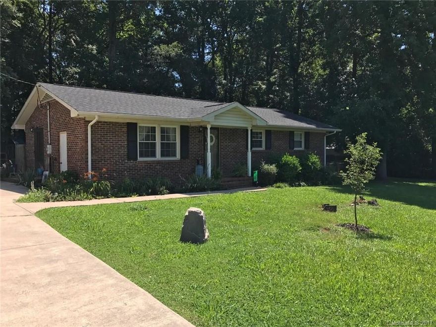 Lovely, well-maintained 3BR/2BA, brick ranch home, fenced yard, patio, newer roof & laminate flooring perfect for first-time buyers or downsizers.  Close to elementary and middle school and minutes to I-77 for NC Commuters.  There are 3 parcels to convey that make up 1/2 acre lot.