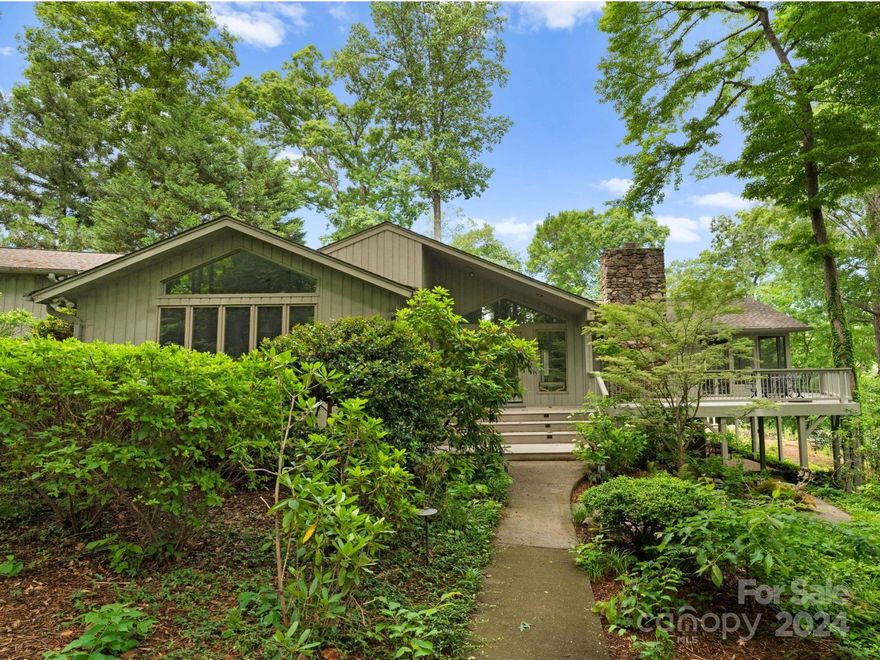 Welcome to your lakeside oasis nestled on 1.56 acres in a quiet cove on Lake Norman. This fully remodeled 6 bedroom home offers a serene and elegant retreat with breathtaking views. As you enter inside, you're greeted by spacious interiors and modern design. Large windows frame panoramic views of the shimmering lake, flooding the home with natural light and creating a sense of tranquility.The gourmet kitchen features high-end appliances, custom cabinetry and quartz countertops. Retreat to the primary suite, where you will wake up to stunning views of the water and unwind in the spa-like bath complete with soaking tub and walk-in shower. Outside, the expansive deck and screened-in porch offer the perfect setting for outdoor dining or lounging in the sun. The boat house and dock have been redone, and boat lift added. With too many features to name, don't miss your chance to experience lakeside living at its finest. House is being sold along with adjacent empty lot.