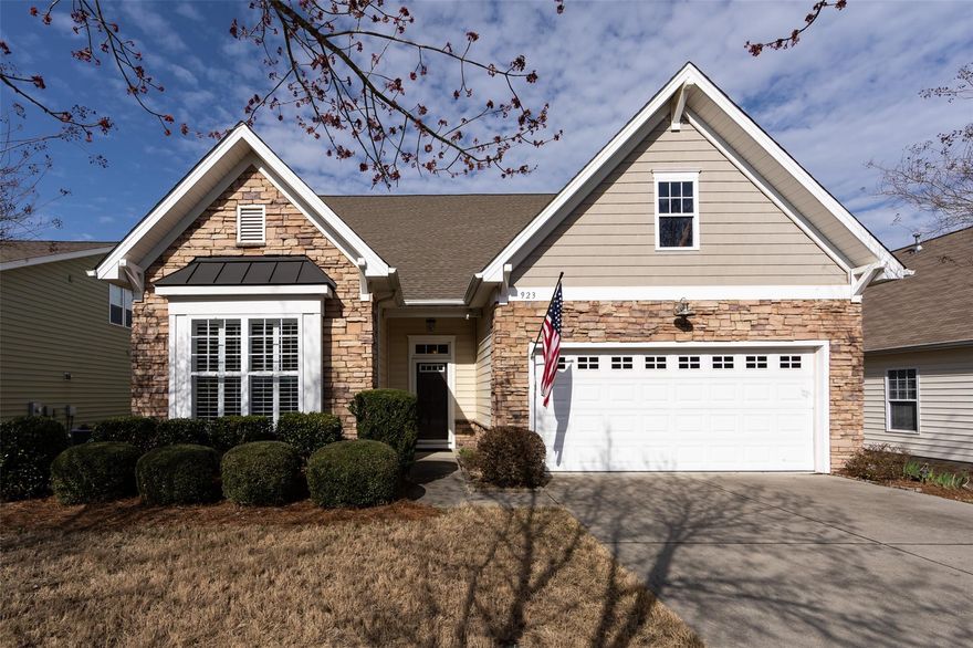 Wonderful opportunity to own a home in the beautiful Tega Cay community on Lake Wylie! This well maintained home with attached 2 car garage offers a split bedroom plan with open living, dining and kitchen area. Plantation shutters on all lower windows for extra energy efficiency. Hardwood flooring throughout main living area and primary bedroom. Primary bedroom has lovely tray ceiling and access to covered porch and patio. Primary bath features double sinks, separate tub & shower, separate toilet room, and walk-in closet. Spacious bonus room up for additional living space! Two walk-in attic spaces off the bonus room for extra storage needs. Enjoy numerous walking trails, parks, playgrounds, pool membership, Tega Cay Golf Club including tennis courts, and Tega Cay Marina for boat slips & lake access!