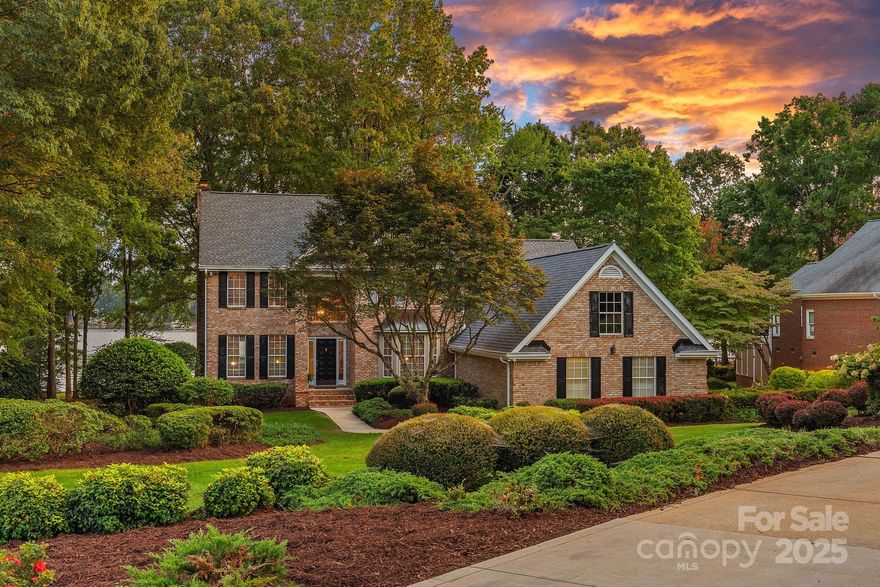 Exceptional waterfront retreat on the prestigious Brawley School Road Peninsula in the coveted Pine Isle neighborhood! This all-brick home sits on a spacious 0.85-acre level lot with approximately 208 feet of stunning waterfront, offering long, picturesque views and a large sandy beach. The private dock includes two boat slips with deep water, perfect for water enthusiasts. Inside, the main level features a primary suite, a dedicated office, a dining room, a large kitchen, and a welcoming two story great room with gas fireplace. With four bedrooms and three and a half baths, this home is ready for your personal touches to transform it into your dream oasis.