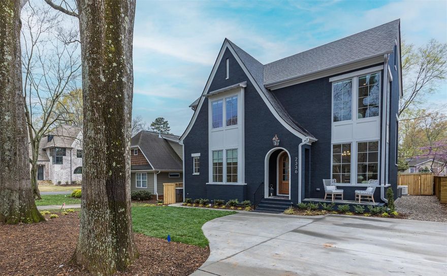 Expect to be impressed as you walk in and feel the luxury and elegance of this latest Grande Custom Builders creation. This home has another one of the classic Grande Custom Builders grandeur elevations. Definition of grandeur.... "splendor in impressiveness, especially of appearance and style". The open floor plan lends to a social lifestyle. In the living room, open up the large custom four panel sliding door system to an oversized screened living area with cedar privacy shutters, outdoor fireplace, skylights, and heaters. Only the finest materials and finishes will be found here. Custom upholstered built-in banquette. A 48 inch Wolf gas range, 42 inch Subzero panel refrigerator, Brizo pull out spray faucet, the quartz waterfall countertops, plus an ELEVATOR. Garage to be built after closing and will be accessed from the alley. Grande Custom Builders grandeur in a one-of-a-kind neighborhood in the heart of the Queen city.