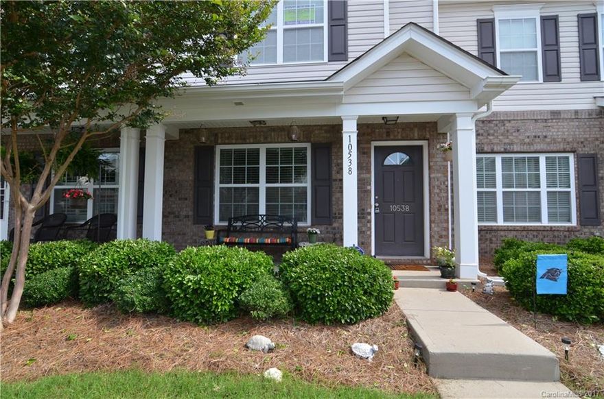 Remarkable townhouse in the Carolina Crossing Subdivision. Two masters up - one with vaulted ceilings and each with their own en-suite bathroom and double closets. Laundry upstairs. Open concept with fireplace in the living room. Kitchen with granite and stainless steel appliances. Lots of natural sunlight and private patio in the back. Land behind is protected.