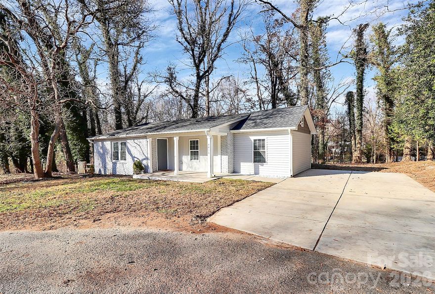 Welcome to this beautifully refreshed ranch home, perfectly positioned on a peaceful half-acre surrounded by mature trees. The moment you walk in, you’re greeted by a bright, airy layout designed for both comfort and style. A completely updated kitchen anchors the space with its white shaker cabinetry, gleaming granite counters, and brand-new stainless steel appliances—ready for your first meal or your next gathering.
Enjoy easy indoor–outdoor living with a deck conveniently located off the kitchen, offering a great spot to overlook your wide, open backyard. The charming front porch adds even more outdoor living potential, ideal for slow mornings or evening relaxation.
Just minutes from all that Kannapolis has to offer—including downtown shops, restaurants, the NC Research Campus, and Cannon Ballers Stadium—this location blends quiet living with everyday convenience. With simple access to I-85 and a short drive to Charlotte, you’ll appreciate the ease of commuting without sacrificing space or serenity.
Nearly every major system has already been upgraded for peace of mind, including a new roof, HVAC, plumbing, electrical, windows, kitchen appliances, water heater, crawlspace encapsulation with dehumidifier, and engineered supplemental support piers—all completed between 2022–2025. 

We are flexible on showing times   Have your agent call the listing agent for special showing times at your convenience.