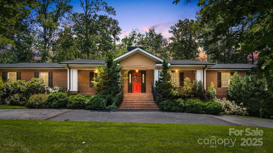 Offer Deadline By Monday Noon. Experience executive living at 3 Amherst Rd, a distinguished home in the prestigious Town of  Biltmore Forest. This exquisite residence offers 4 bedrooms and 3.5 baths, featuring a spacious open living plan, grand foyer, an impressive, great room show- stopper connecting to a gourmet kitchen and formal dining room. The lower level is an entertainer's dream, boasting a sophisticated glass temperature controlled wine cellar, a second full kitchen, state-of-the-art media theatre room, dedicated library area and guest suite. Enjoy seamless indoor-outdoor living with three distinct patios, all situated on a meticulously landscaped .76-acre lot with a double garage. This home is primed and ready for you to make it your own! Close to Biltmore Estate, Restaurants, Hospital, and shopping.  The Town of Biltmore Forest also has two community parks, a private golf club (Biltmore Forest Country Club), and is known its charm, natural beauty, and proximity to Asheville