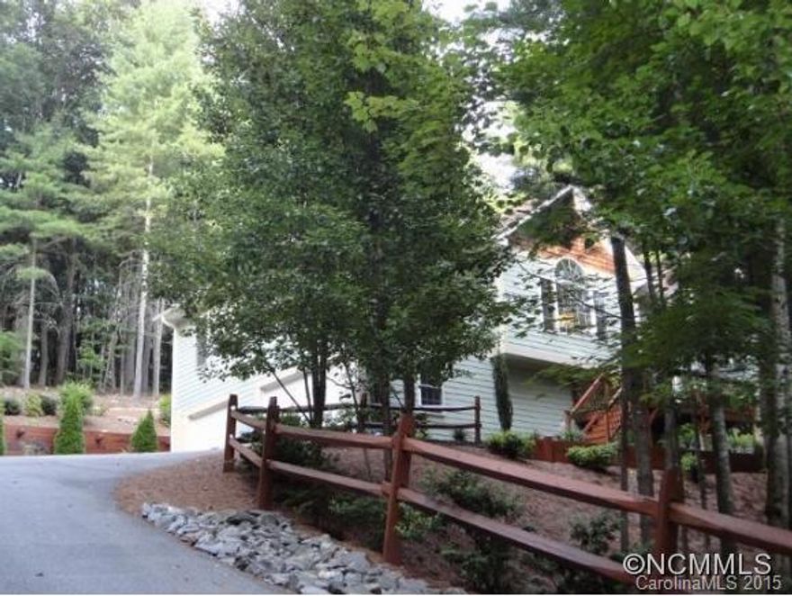 Spectacular move in ready home just 3 miles to VA Hospital & 12 minutes to downtown. Living room with vaulted ceiling & gas fireplace opens to dining area. Hardwoods & 9' ceiling throughout the main floor split bedroom plan. Large updated master suite w/tiled shower & jetted tub. Granite counters throughout. Family room/den with separate entry offers office or guest space. Big private deck prepped for hot tub. Beautiful low maintenace landscape.