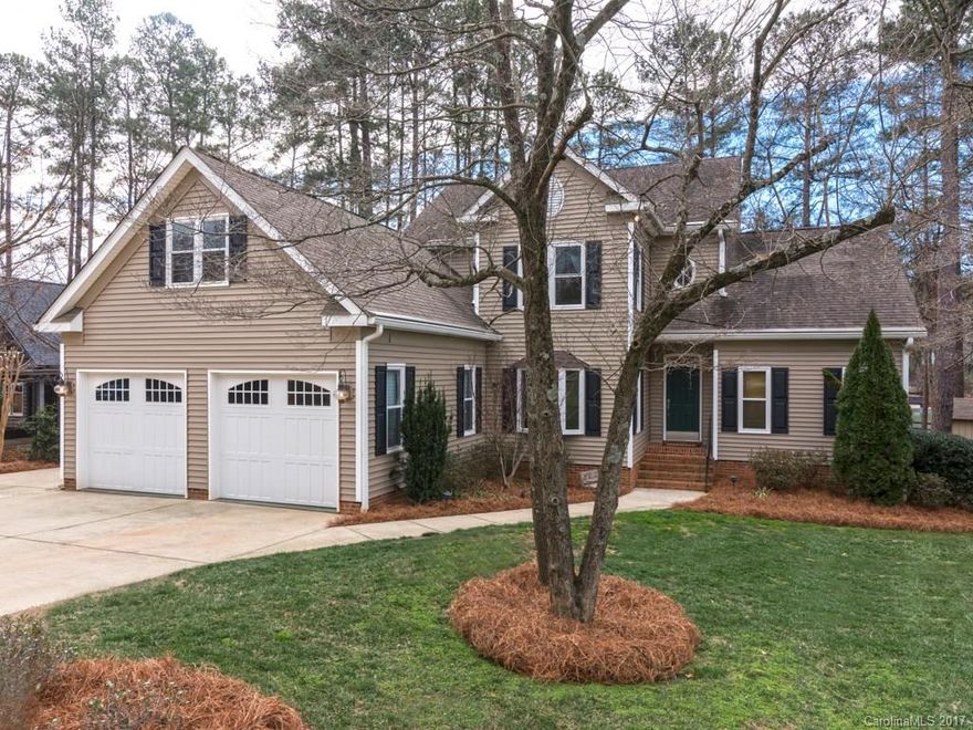 Attractive waterfront home in quiet lakeside neighborhood with easy commute to Charlotte. This low maintenance home features over 140ft of shoreline, deep water, w/ beautiful like new dock w/ 2 sitting spaces & wide views of LKN. The large level lot has plenty of space to enjoy all outdoor activities or relax in yr main level master suite or the many rooms offering lake views.Pls see attachments for the many upgrades to this home incldg new tankless water heater, windows, shades and many more.