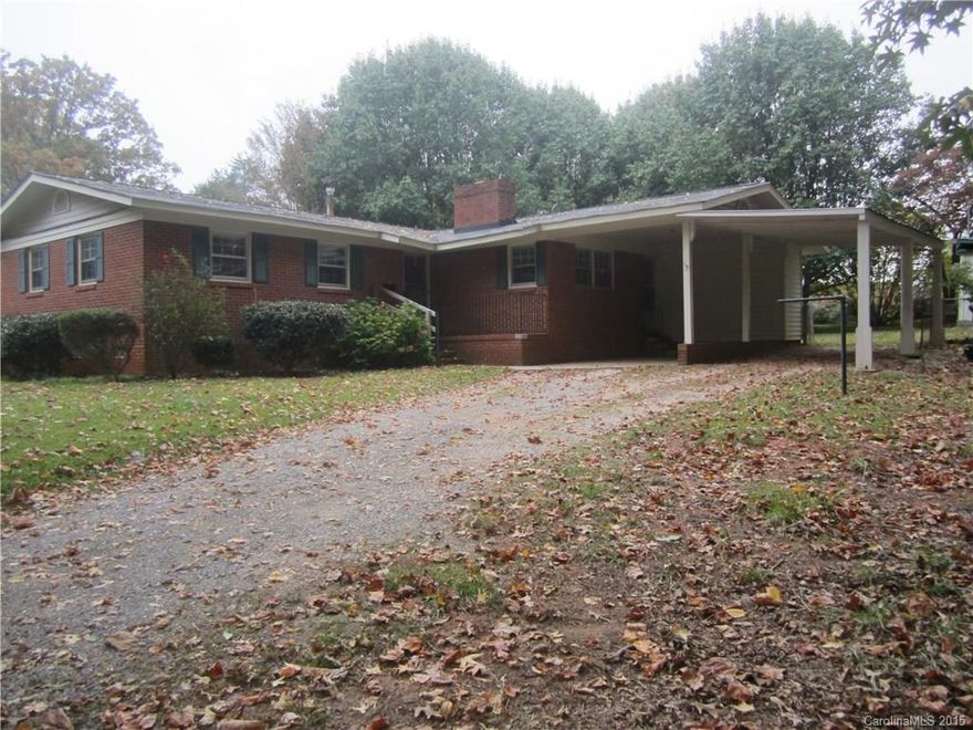 All brick 3BR, 2BA ranch on nice size lot w/fenced back yard and large covered deck for entertaining. Other features include formal living room, den w/fireplace, all kitchen appliances stay, attached two-car carport and attached and detached storage buildings. Close to schools, restaurants and easy access to I-77.