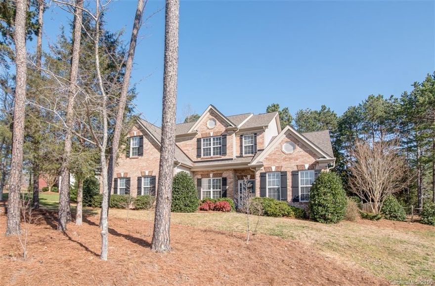 Charming brick front corner lot home on a half acre of beautifully landscaped property with fenced back yard in established Crismark neighborhood. 5 bedrooms 3.5 baths.  Many custom touches. Extra large kitchen with granite counters spacious island and over-sized eat in breakfast area. Two story great room has abundant natural light with pleasant views of tree lined lot. Master Bedroom on lower level with huge walk in closet. All upstairs bedrooms also have walk in closets. Minutes to 485