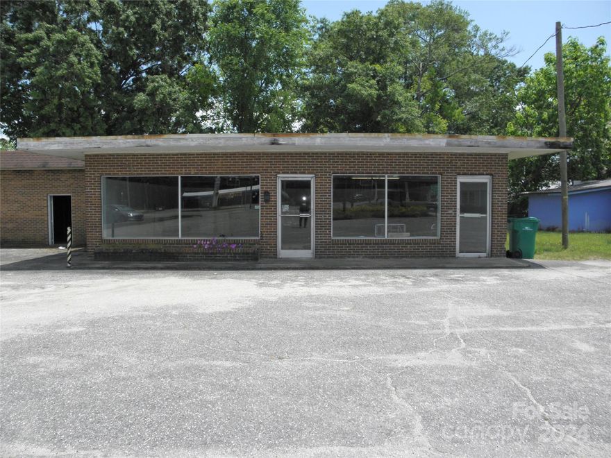 Perfect location with easy access and high visibility makes this former auto parts store a great opportunity for entrepreneurial auto techs and enthusiasts. Conveniently located near the intersection of US #1  and Hwy #9 near the business district of Cheraw, SC.  This property includes two parcels: One parcel includes 0.42 acres with an 8,590 SF commercial flex-building improvement which includes 1,739 SF retail/office space  (1/2 bathroom); 6,851 SF garage/storage area; and a 185 SF overhang. The garage/storage area is divided into a 3-bay garage with one bathroom, a 1-bay garage with a bathroom, a 1-bay garage, and storage area. The other parcel is a 0.18-acre asphalt parking lot which provides ample parking spaces. This property is being "sold as-is."