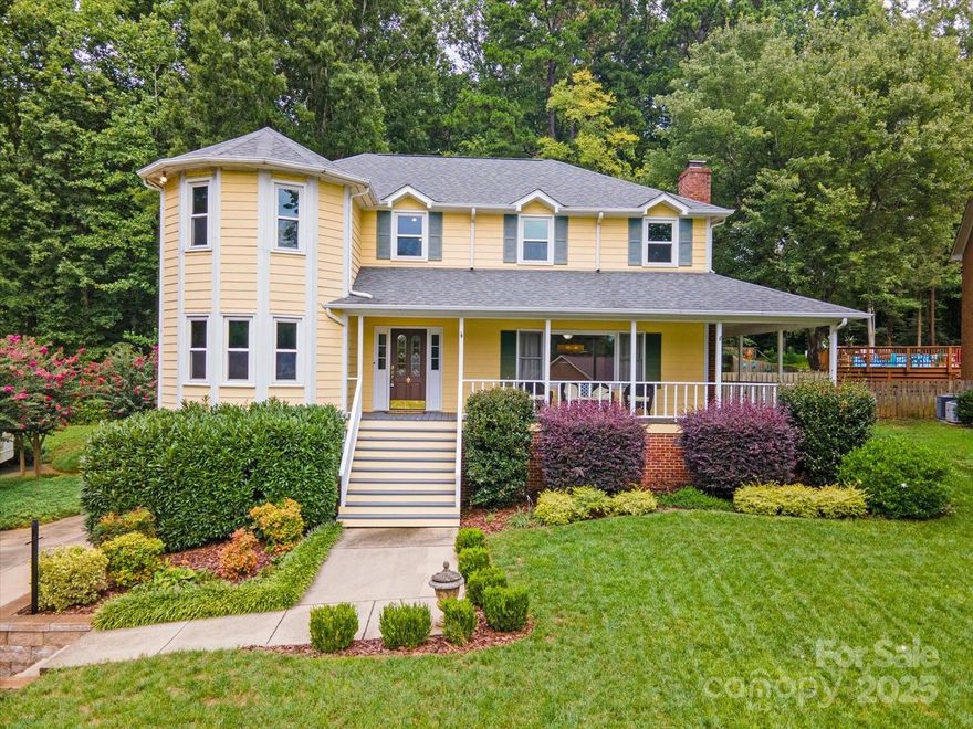 This approximately 2,483 square foot home on a half acre lot offers an abundance of space and a beautifully landscaped exterior. The inviting covered porch and charming exterior create a welcoming atmosphere, while the peaceful setting and lush greenery provide a serene backdrop. Inside, the home features four bedrooms and three bathrooms, with a spacious layout and elegant fixtures throughout. The living areas showcase stunning hardwood floors and recessed lighting, creating a warm and inviting ambiance. The spacious kitchen is equipped with ample cabinetry and abundant countertops, providing ample room for meal preparation. Large, expansive windows offer scenic outdoor views, highlighting the lush landscaping and peaceful surroundings. Additionally, the home includes an office with built-in bookshelves, providing versatile living spaces. The backyard is a true oasis, featuring a spacious patio, mature trees, and a swimming pool, perfect for outdoor relaxation and entertainment. The home is situated in a quiet, desirable neighborhood with no through traffic, as most streets end in cul-de-sacs, ensuring a peaceful living experience.  For parking, there is a spacious basement/side-entry garage with ample room for a workshop and storage areas.  This property offers an ideal setting for those seeking a spacious, well-maintained home with abundant outdoor amenities and a serene, tranquil atmosphere. *Main Level is heatpump with alternate/supplement gas. Upper Level is electric only.