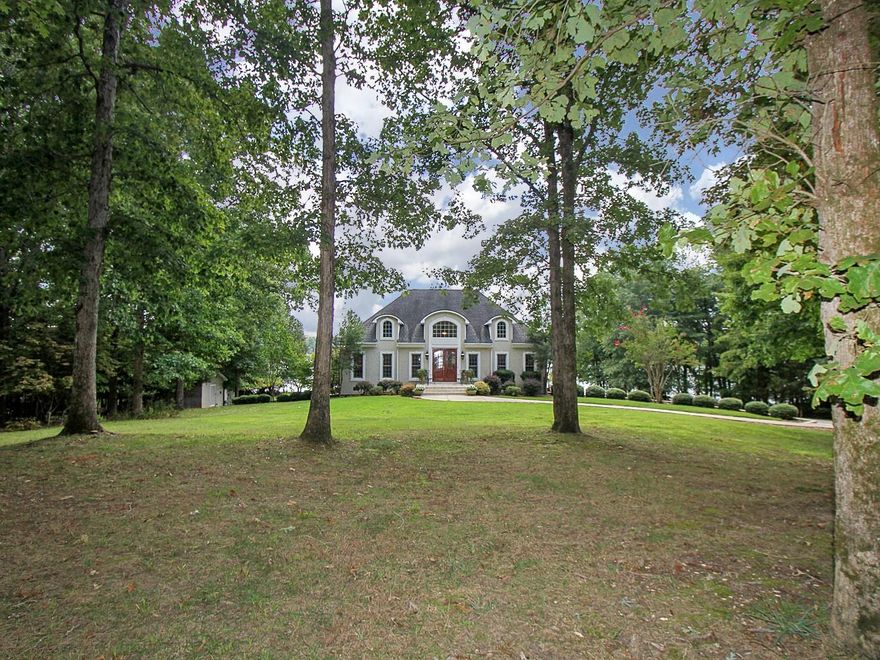 Welcome to Lake!  This beautifully furnished 4 bedroom 3.5 bath home is nestled at the back of Little Allison Creek on Lake Wylie.  It resides in a very private like setting and boasts great water views, floating dock & pier with a covered seating area. 2 car garage. Enjoy the open fire pit on a cool spring or fall evening. Truly an entertainers delight with a great deck, covered patio and tons of extra parking.  Extremely relaxing environment to enjoy the  tranquility of nature. Bring your boat and paddle boards.  This home has been well maintained with lots of living space. Primary Suite is on the main floor with 3 additional bedrooms/2 bathrooms on the lower level.  Lawn maintenance and utilities are included with conditions.  No subleasing. Conditional pet approval. Owner Occupied.  Appointments only!