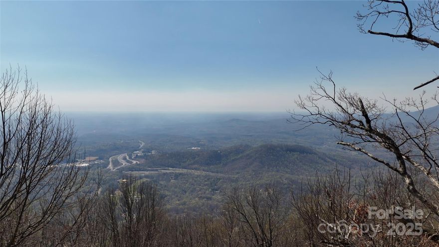 Breathtaking! Top of the World Views! This lot sits on the edge of White Oak Mountain, looking Eastward ... forever ... Incredible UNobstructed, Long Range Views! Sellers have already begun planting decorative bushes and Trees, INSTALLED a 2 bedroom Septic Tank, & had plans of building a 1400 +/- SQFT cabin. White Oak Mtn provides its owners with picnic areas, trails, fishing ponds Waterfall, & more!  Buyer still needs to drill a well.  You will not find a more unique lot than this - This is a Must See Lot.   (NO SIGN)   The power line easement runs to the left of the property.