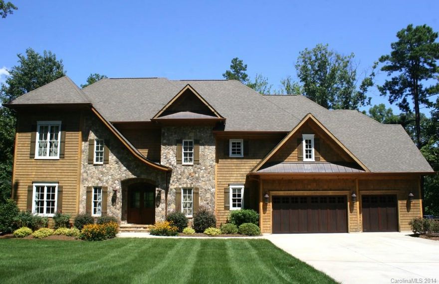 Stunning Waterfront Home! Have it all, a great Lake Lifestyle with a private mountain feel with the surrounding beautiful mature trees! Great location, Min. to Birkdale Village & I 77! This house is perfect for entertaining! Incredible Kitchen with top of the line appliances & cabinets! Very spacious dining room w/ crawford ceiling! Amazing open 2 story great room over looking the terrace, pool & Lake Norman. Covered porch w/ outdoor fireplace! Sandy beach area! Huge multi purpose basement area!