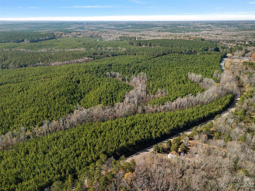 Rare in size and in opportunity, this gem is conveniently located 40 minutes South of Charlotte! +/- 190 acres!! Abundant wildlife, acres of hardwood bottoms, Tinkers Creek flowing through the back of the property, and loblolly pine production! This can be used for Hunting/Recreation, income potential, forestry/agricultural, deferred taxes, or a personal residence!  Close to I-77 and HWY 21, there is electricity available, quality soil for conventional septic systems, and most importantly, Internet!! With over 6000' of road frontage; many options for homesites. If you are looking for a tranquil homestead tucked back in the woods, this is the piece of land for you!  Pursue building your dream home and embrace the country lifestyle.  This charming property is here for you to enjoy with family and friends.  Loaded with animals for recreation and hunting purposes. This sale is subject to a completed survey. * More land available for sale, Survey and soil map available upon request*