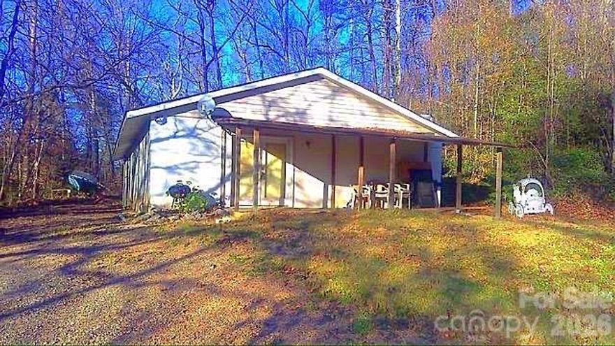 Spacious and secluded 2.66-acre property offering strong investment potential. Home features a 2015 roof and was previously used as a rental; the owner has now decided to sell. The parcel includes a large septic system sized to support up to four homes (per seller), 2 wells (currently only one is hooked up), and provides options for future expansion or redevelopment! Property is being sold as-is. Buyers and buyers’ agents to verify all information, including septic capacity and any development possibilities. Motivated seller, investors do NOT contact the seller directly.