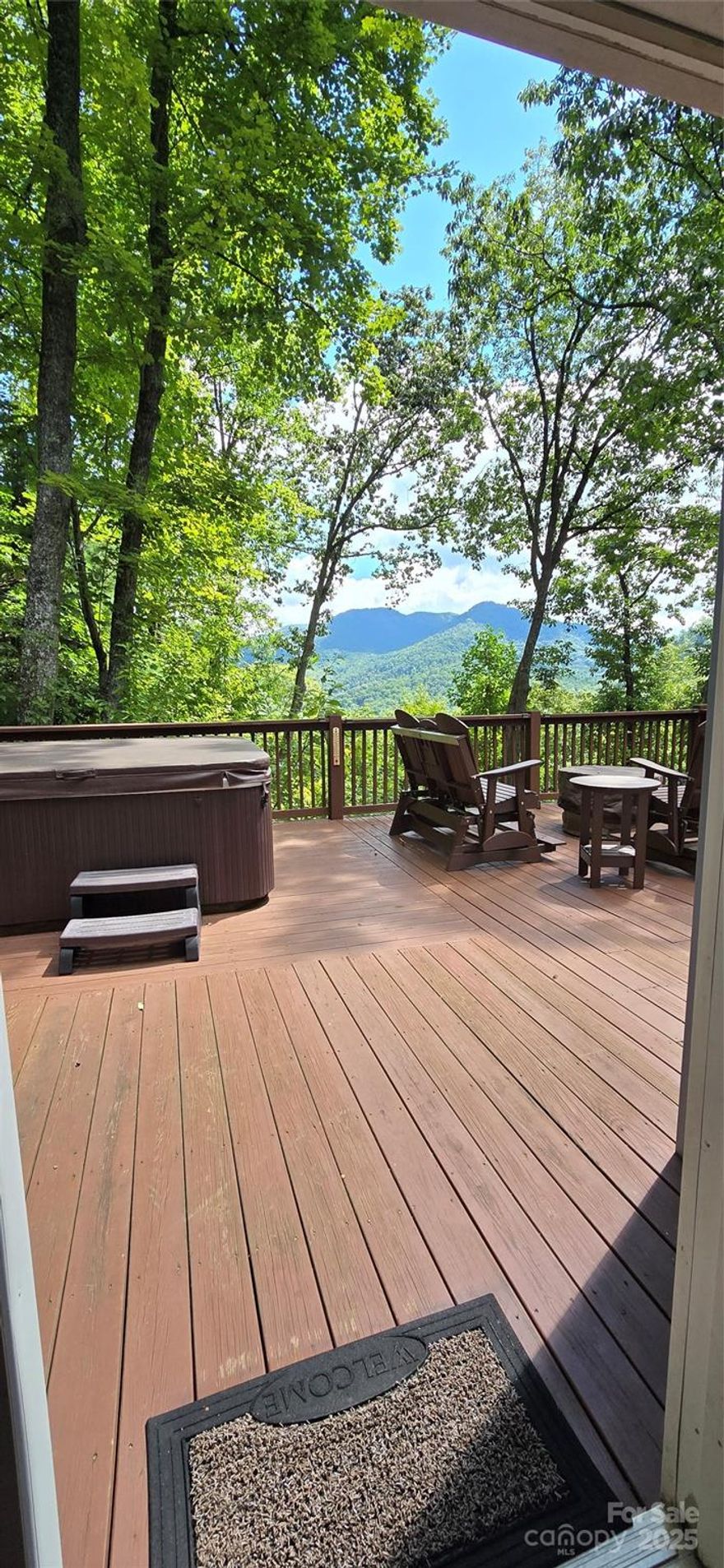 Your Private Retreat on 3 acres +/- with Breathtaking TRUE Mountain Views from this thoughtfully designed home w/ plenty of outdoor living space! This Home blends Charm, Comfort & Functionality with Veranda doors that open to an Expansive Deck, and a Grand Spa/Jacuzzi perfect for relaxing and/or having large gatherings. Cozy up by the Soaring Fireplace with one or Many! The Main FULL Kitchen boasts Stainless Steel appliances etc., plus a 2nd Full kitchen on the lower level for flexibility (minus a stove). Outside, enjoy both a covered & uncovered Deck. The property includes a detached 12' X 28' Garage/Workshop w/ A/C & Running Water providing for an assortment of creative options!!!
This Beautiful Retreat offers "Serenity Now", plenty of Space, and/or an excellent investment opportunity as is currently a successful STR!
A Must-See as a Primary Residence, or continue using it as a Successful short-term rental. 
Just one of the many great benefits about this Home is the LOCATION, Location, Location... You can be in Downtown Asheville in under 26 mins.! And ONLY 37 mins. to The WOLF SKI Slopes & Resort!!!
Bonus room currently being used as a 4th Bedroom!
This extremely well maintained Home is being offered Fully Furnished, with the very High-end Spa too!
A real MUST SEE!!!
Make your reservation to see it TODAY!