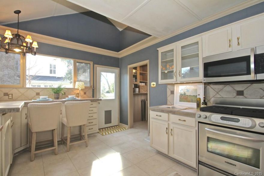 Beautiful Cape Cod Style Home In The Desirable Oakhurst Neighborhood! Located Within Minutes Of Uptown, This Lovely Home Is Loaded With Character - Original Knotty Pine Interior, Hardwood Floors, Renovated Kitchen & Master Suite, Rocking Chair Front Porch & HUGE Fenced In Yard w/ Patio For Entertaining.