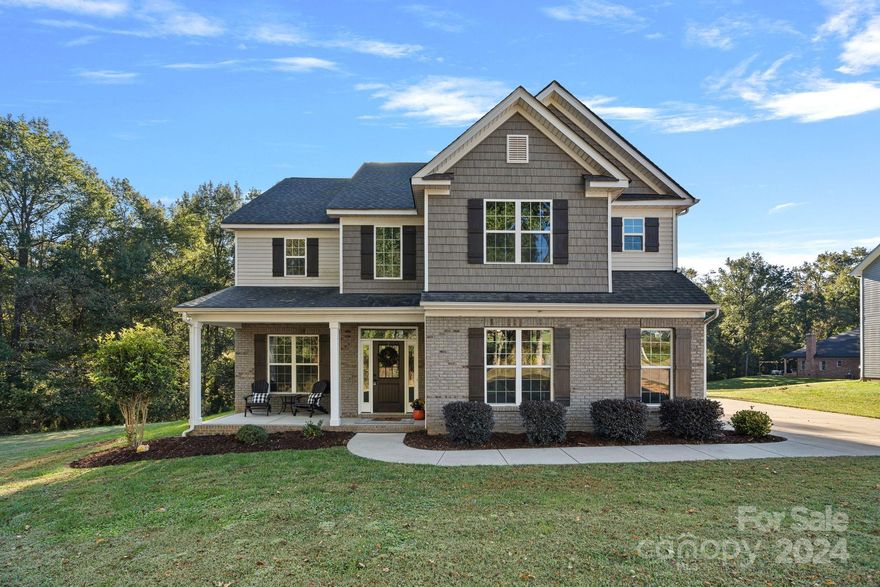 DON'T MISS IT THIS TIME!  Looking for a like new home that has it all? Look no further; this stunning property is located just 15 minutes away from 485 and a short 5-minute drive to Highway 218. This modern, countryside-style home boasts over an acre and a half of land in Union County. The open floor plan is filled with natural light, making it perfect for family gatherings. The formal dining area leads into the well-equipped kitchen, complete with island, granite countertops, and a stylish tile backsplash. Enjoy the spacious family room, complete with a cozy fireplace, or take the party outside to the oversized backyard. Upstairs, the primary suite boasts tray ceilings, dual walk-in closets, a luxurious spa-like bath with a soaking tub, and separate shower. Two additional bedrooms, a large bonus room, and a full bath provide plenty of space for everyone. Be sure to check out the freshly updated laundry room as well! This meticulously-maintained home is waiting for you!