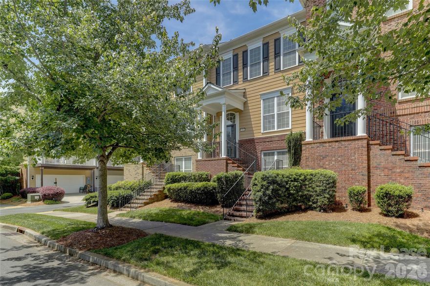 Fantastic updated townhome just steps from Baxter TownCenter, featuring popular restaurants, Starbucks, wine bar, fitness center, the Fort Mill library, & much more. This townhome has it all with updated lighting, new tiled kitchen backsplash, new quartz countertops in kitchen & bathrooms, new LVP flooring, new tiled fireplace, all new KitchenAid Appliances w/ gas range, center island in the kitchen, & extra full sized fridge in garage. This 3-bedroom, dual-primary bedroom floor plan works great for a variety of situations! Both Primary bedrooms feature walk-in closets with built-ins! Each bedroom has its own full bathroom plus there is a powder room on the main level. The spacious great room has a gas log fireplace. The lower level features the 3rd bedroom w/ full bath & large walk in storage area. Plus 2-car garage w/ excellent storage & plenty of parking! Convenient access to I-77 and easy commute to Charlotte. Don't miss your chance of enjoying all that Baxter Village has to offer!