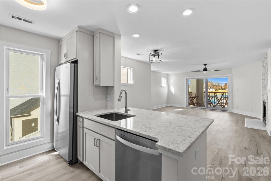 New Listing! Welcome to effortless Lake Norman living in this beautifully renovated second-floor condo, where every detail has been thoughtfully updated so you can simply move in and enjoy. This home has been completely gutted and remodeled, including new windows(except 5 square ones),  a sliding patio door with screen, a replaced balcony deck, all-new exterior siding, and a brand-new HVAC system.

Inside, you’ll love the fresh, modern feel with a stacked stone fireplace(needs electric insert) anchoring the living space. The renovation includes all-new plumbing, tub, shower, sinks, faucets, lavatories, custom soft-close cabinetry, counters, flooring, and new appliances—refrigerator, stove, microwave, dishwasher, and disposal. Additional updates include new electrical and lighting, fresh paint, new doors, baseboards, trim, hardware, and shelving, making this home truly turnkey.

Step onto the back balcony deck overlooking the pool and Lake Norman, the perfect spot for morning coffee or winding down after a day on the water. Enjoy resort-style community amenities including an on-site Lake Norman Boat Club with memberships available, outdoor pool, gas grills and picnic areas, kayak and paddleboard storage (fee), scenic walking paths, and pickleball and tennis courts.

Whether you’re boating, paddling, or relaxing poolside, this home offers the lake life lifestyle you’ve been dreaming of—move-in ready and waiting.
