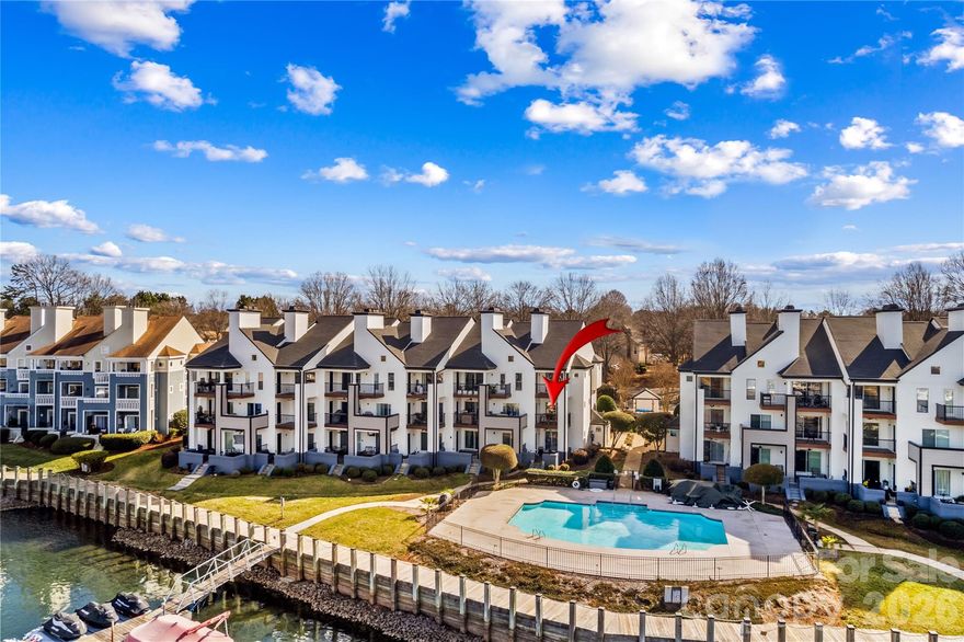 New Listing! Welcome to effortless Lake Norman living in this beautifully renovated second-floor condo, where every detail has been thoughtfully updated so you can simply move in and enjoy. This home has been completely gutted and remodeled, including new windows(except 5 square ones),  a sliding patio door with screen, a replaced balcony deck, all-new exterior siding, and a brand-new HVAC system.

Inside, you’ll love the fresh, modern feel with a stacked stone fireplace(needs electric insert) anchoring the living space. The renovation includes all-new plumbing, tub, shower, sinks, faucets, lavatories, custom soft-close cabinetry, counters, flooring, and new appliances—refrigerator, stove, microwave, dishwasher, and disposal. Additional updates include new electrical and lighting, fresh paint, new doors, baseboards, trim, hardware, and shelving, making this home truly turnkey.

Step onto the back balcony deck overlooking the pool and Lake Norman, the perfect spot for morning coffee or winding down after a day on the water. Enjoy resort-style community amenities including an on-site Lake Norman Boat Club with memberships available, outdoor pool, gas grills and picnic areas, kayak and paddleboard storage (fee), scenic walking paths, and pickleball and tennis courts.

Whether you’re boating, paddling, or relaxing poolside, this home offers the lake life lifestyle you’ve been dreaming of—move-in ready and waiting.