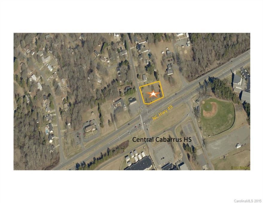 +-0.73 acres located on the corner of a signalized intersection of Hwy 49 in Concord.  Property is directly across the street from Central Cabarrus High School.  Potential uses include C-store, fast food, and other retail and office uses.  List of permitted uses available upon request.