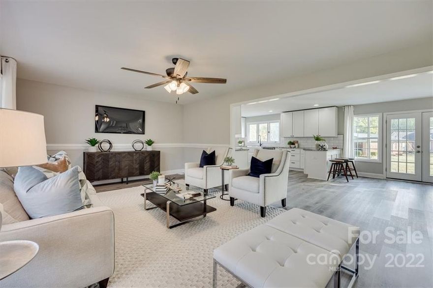 Exciting Update: Huge Price Reduction!!!! Seller will replace damaged windows prior to closing.  NO HOA and NO CITY TAXES!!  This home is perfect for a large family and entertaining with all the open spaces. Numerous updates including: new roof, luxury vinyl plank floor covering, designer lighting and much more! The open kitchen is beautifully appointed with SS appliances, tile back splash and designer counter tops. Gorgeous designer accent tile work in the bathrooms. The private flex space on the main floor is perfect for a private office or a space for home schooling. The lower level has secondary living quarters with a separate exterior entrance. This would be perfect for a mother in law suite, entertainment area with bar or to rent out for additional income. The generous backyard has a fire pit and plenty of room for the kids to play, for your furry four legged friend to run laps or for parking for your RV or Boat. Be home for Christmas!