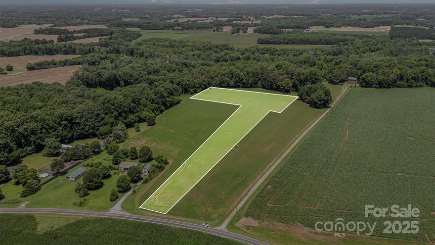 **SOLD AS PACKAGE DEAL W/ MLS #4274323** Discover five beautiful acres in a rapidly growing area of Rowan County—just minutes from scenic Sloan Park and with easy access to I-85 for a quick commute to Salisbury, Concord, Mooresville, or Charlotte. This level, open property has already perked for a 4-bedroom home, offering endless potential for a private homesite, mini-farm, or investment opportunity. With no deed restrictions for building, manufactured and modular homes are welcome. High-speed internet through Spectrum is available—perfect for those who work from home. Enjoy peaceful rural surroundings with the convenience of nearby amenities and continued development all around. Gorgeous land in a prime location—don’t miss your chance to own a piece of it!