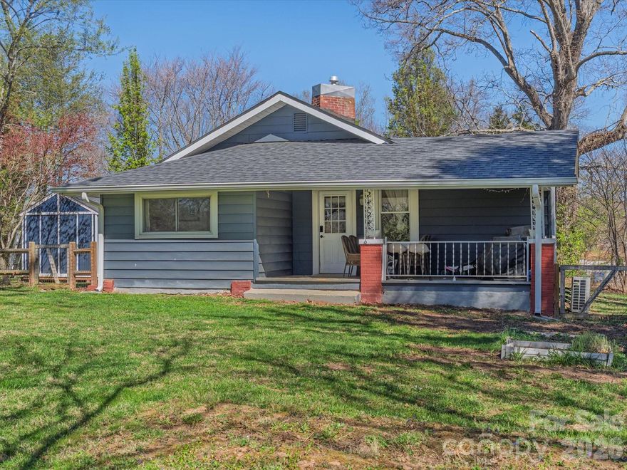 Charming bungalow tucked into a sought-after Arden location, thoughtfully updated in 2020 with a modern farmhouse touch. A modern palette of colors creates a clean, welcoming feel throughout.Natural light fills the home, highlighting a spacious living room with custom built-ins and a dedicated dining area perfect for gathering. The kitchen offers both functionality and charm, with space for casual meals, while a pull-down attic provides additional floored storage.Step onto the covered front porch—ideal for rocking chairs and slow mornings—and take in one of this home’s standout features:A beautifully level, generously sized yard that offers endless possibilities—whether it’s play space, gardening, entertaining, or simply enjoying the outdoors. A storage shed is also included, adding convenience and extra room for tools or hobbies.Located just minutes from local favorites,12 bones, Lake Julian, and multiple grocery stores, this home blends comfort, style, and everyday convenience.Come see what makes this one special.