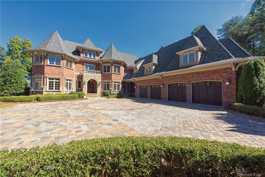 Move in Ready! Stunning attention to detail & finishes adorn this custom LKN waterfront w over 180 ft of LKN shoreline & a 4 car garage w/ample parking. Step inside this estate w/freshly refinished floors, paint & new carpet boasting water views from most rooms. Prep meals in mirrored kitchen great for prep. Master on main w/4 addtl bdrms up, an office/bonus room w/veranda overlooking pool/lake + a study/library, rec room & media area. 3rd floor finished w/sewing/exercise room & walk in storage.