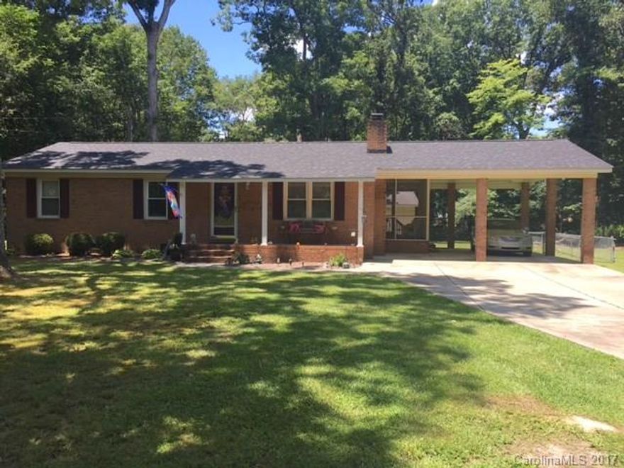 Beautifully maintained home with updates. New hardwood floors, paint and roof! Great side screened porch. Large front and back yard with deck, fence and attached and detached storage. Very private lot. This home is great for downsizing or just starting out. Seller has tile and hardwoods to let buyer finish kitchen and baths with their choice. This home is being sold as is. Seller is not able to make any repairs but doesn't know of any issues.