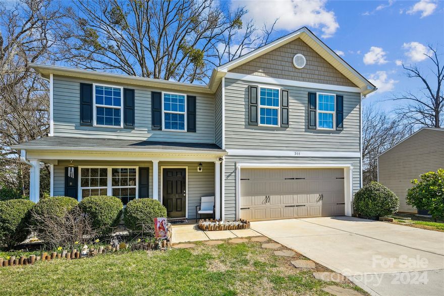 Welcome to your dream home in the highly sought-after location of Fort Mill! This pristine property boasts 4 bedrooms and 2.5 bathrooms, providing ample space for comfortable living.  As you step inside, you'll be greeted by a spacious and inviting living area, perfect for entertaining guests or enjoying cozy family moments. Well-designed kitchen is a chef's delight, featuring plenty of counter space. Main level with office/den or it could be used as formal dining area.  Primary bedroom is a true retreat, with a luxurious en-suite, 3 additional bedrooms ensure there's room for everyone. Laundry room located on the 2nd level with built in linen cabinet & new washer. Backyard features mature landscaping and privacy. The property's curb appeal is enhanced by its manicured lawn, custom garden boxes & landscaping, making it a standout in the neighborhood.  Conveniently close to amenities, top-rated schools, & the vibrant local culture. Don't miss this opportunity. Schedule a showing today!