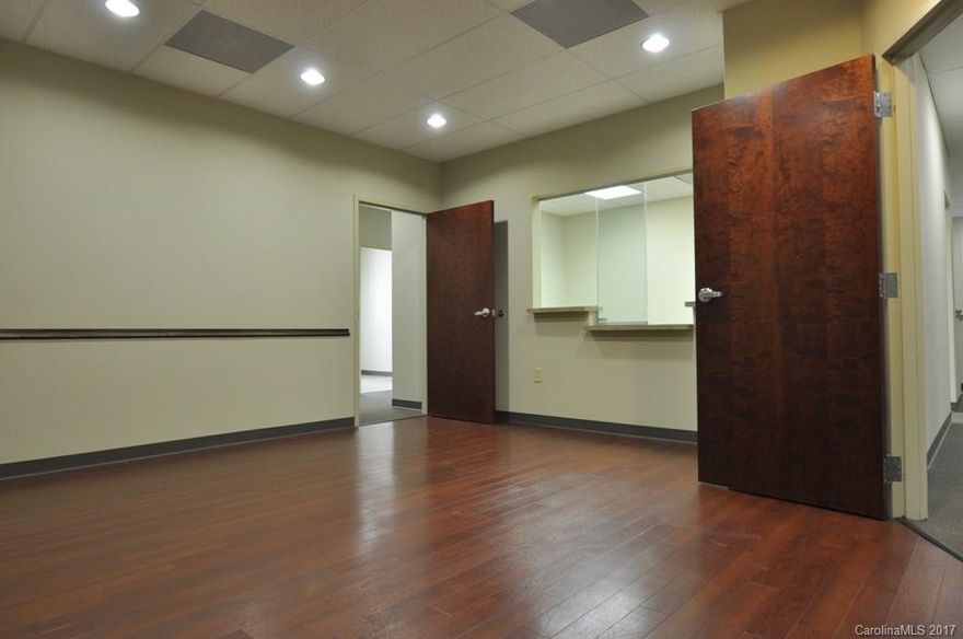 Ready to move into Medical Office Condo that is custom-designed within .07 miles to the hospital. 2,225 square feet with 6 exam rooms, 3 offices, two nurses station, filing room, two restrooms and an oversized reception area. Walking distance to shops, restaurants, and entertainment options.