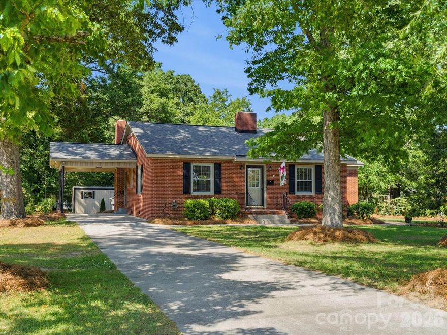 Charming full brick home in desirable Clover! This 3 bedroom, 1 bath property offers a perfect blend of classic character and thoughtful updates! Beautiful hardwood floors flow throughout the living area and bedrooms, creating a warm and inviting feel. The eat in kitchen features a convenient breakfast bar, perfect for casual dining. An attached carport provides added ease and covered parking. Enjoy relaxing on the patio overlooking the beautiful backyard ideal for entertaining or quiet evenings. Conveniently located just around the corner from downtown Clover, you’ll love the easy access to local shops and dining. A great opportunity to own a beautiful home in a sought after location! You don’t want to miss this one! Welcome home to 419 Knox Street!