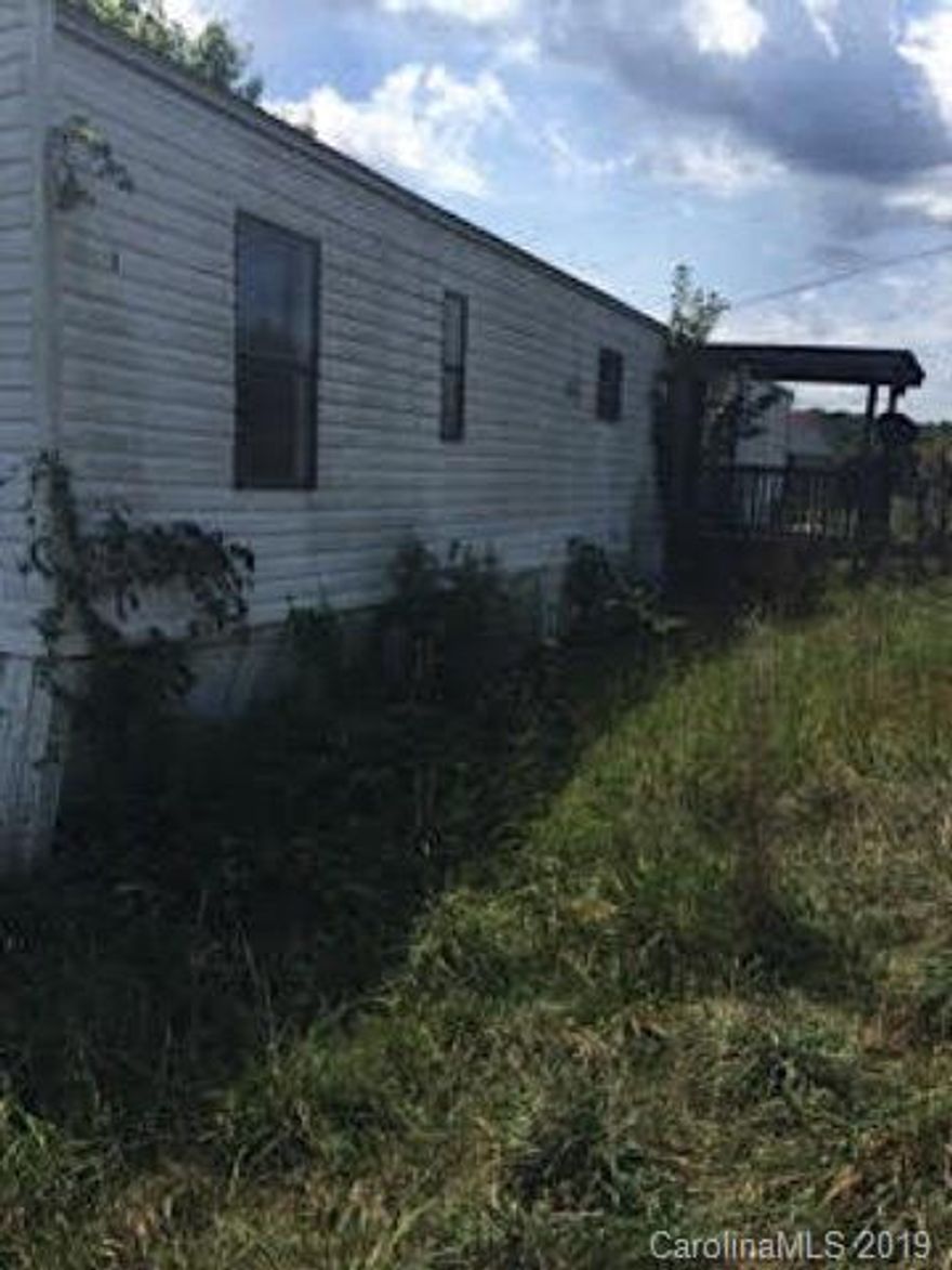 Single wide mobile home that needs repairs in order to be habitable. After repairs, it would make a terrific rental or primary residence. Being sold as-is.