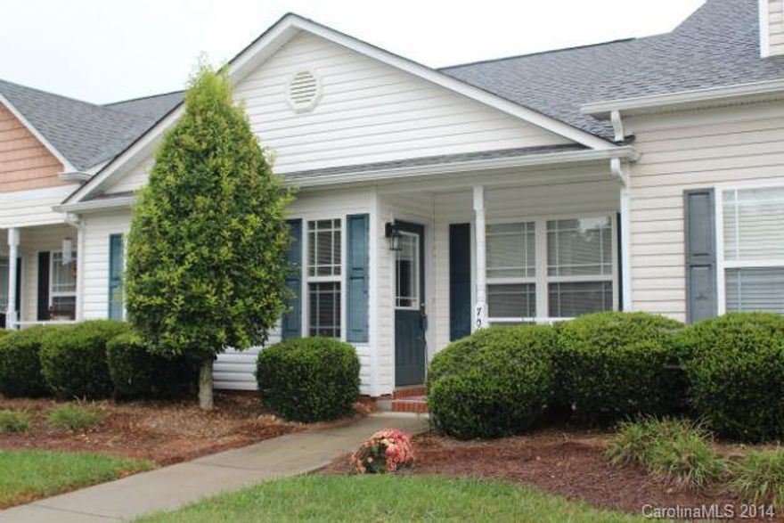 Charming ranch townhome with a patio and front porch.  Both Bedrooms have full Baths! Large Great Room features an entry way and vaulted ceilings.  Kitchen comes with all appliances including refrigerator!  Laundry closet also comes with washer and dryer! Low HOA fees!