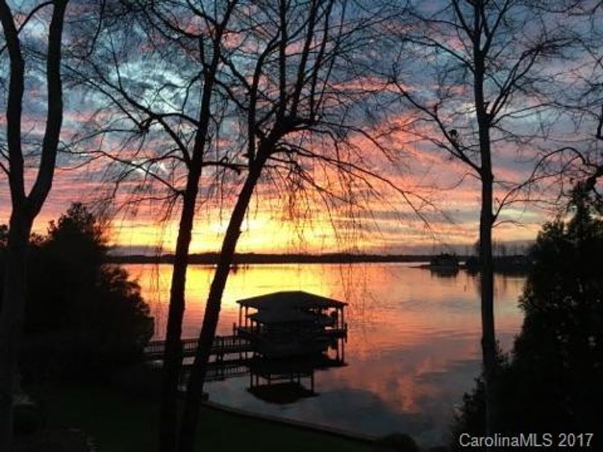 The home is  process of being professionally measured.  Gated Waterfront home with Sunsets and Unobstructed Views.  Upgrades in this custom built original builders home. Gourmet Kitchen, Mahagony off, 2 Master Bed Suites, New Wine Room and more. Outdoors feature covered patio with blt ingrill and FPL., terraces, screened in porch,  inground pool,  Kitchen, Covered Boat dock, Gazebo and Custom Brick! Stone Seawall. In The Harbour with  pool ,tennis and more!  Area neighbors with TNGC.