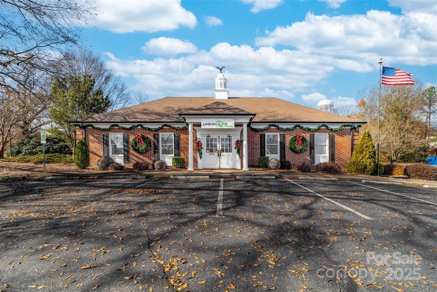 Super opportunity to own this exquisite office building. Corner lot in Shelby on Dekalb Street/Earl Rd/Intersection of Hwy 74. There are 11 spacious offices, reception room and waiting areas, large conference room, 3 bathrooms, a kitchenette, and multiple storage rooms or smaller offices.  Easy entrance with two access points from Dekalb and Earl. 30+ parking spaces on three sides of the building, two private entrances, and side delivery entrance.  The grounds are landscaped and meticulously maintained, security system and handicap access.  Currently used as Mortgage Office but other suggested uses are law firm, accounting office, dentist or counseling office.