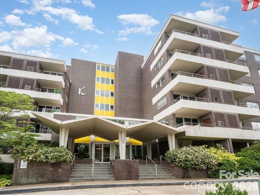 Own a piece of Charlotte history in this unique Mid-Century Modern gem in the heart of Myers Park, just steps from shopping, dining, and entertainment.

This rare penthouse corner unit offers 1,700 square feet of thoughtfully designed living space featuring two bedrooms and two full bathrooms. Flooded with natural light from its corner positioning and expansive windows, the home feels bright, open, and inviting throughout. Built-in bookshelves add both character and functionality, enhancing the architectural charm of the space.

The flexible floor plan provides generous living and dining areas, with the option to convert the living room into a third bedroom if desired — offering versatility to fit your lifestyle.

Enjoy unobstructed sunrise and sunset views from not one, but two private balconies — the perfect setting for morning coffee or evening unwinding.

Inside, you’ll find numerous updates including a newly replaced HVAC system (2024) with an in-line air filtration system, hot water heater (2022), luxury vinyl plank flooring throughout, plantation-style shutters, new granite countertops, upgraded appliances, professionally painted cabinetry, and additional in-unit storage.

Residents enjoy exceptional amenities including an outdoor pool, Skylounge, fitness center, community garden, guest suite for visiting friends and family, and a private pedestrian bridge providing direct access to Park Road Shopping Center.

Ideally located just a 5-minute walk to greenway access and approximately 15 minutes to Charlotte Douglas International Airport, this home offers both tranquility and convenience.

The unit also includes one deeded parking space and two dedicated storage lockers — a rare and valuable bonus.

A true blend of architectural character, modern updates, abundant natural light, and unbeatable walkability — this is condo living at its finest.