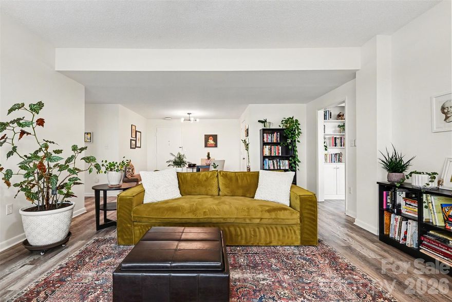 Own a piece of Charlotte history in this unique Mid-Century Modern gem in the heart of Myers Park, just steps from shopping, dining, and entertainment.

This rare penthouse corner unit offers 1,700 square feet of thoughtfully designed living space featuring two bedrooms and two full bathrooms. Flooded with natural light from its corner positioning and expansive windows, the home feels bright, open, and inviting throughout. Built-in bookshelves add both character and functionality, enhancing the architectural charm of the space.

The flexible floor plan provides generous living and dining areas, with the option to convert the living room into a third bedroom if desired — offering versatility to fit your lifestyle.

Enjoy unobstructed sunrise and sunset views from not one, but two private balconies — the perfect setting for morning coffee or evening unwinding.

Inside, you’ll find numerous updates including a newly replaced HVAC system (2024) with an in-line air filtration system, hot water heater (2022), luxury vinyl plank flooring throughout, plantation-style shutters, new granite countertops, upgraded appliances, professionally painted cabinetry, and additional in-unit storage.

Residents enjoy exceptional amenities including an outdoor pool, Skylounge, fitness center, community garden, guest suite for visiting friends and family, and a private pedestrian bridge providing direct access to Park Road Shopping Center.

Ideally located just a 5-minute walk to greenway access and approximately 15 minutes to Charlotte Douglas International Airport, this home offers both tranquility and convenience.

The unit also includes one deeded parking space and two dedicated storage lockers — a rare and valuable bonus.

A true blend of architectural character, modern updates, abundant natural light, and unbeatable walkability — this is condo living at its finest.