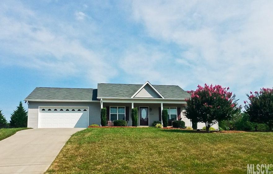 The home you deserve!! You'll love living is this custom built, quality 3 bedroom 2 bath ranch with shiny hardwood floors through out and tile in the baths. The Great  vaulted ceilings, maple cabinets in kitchen and baths, walk in closets, separate laundry room and extra storage in the garage make this is perfect home.  Relax on your covered front porch or invite the neighbors for a cookout in the flat, private, fully fenced rear yard.