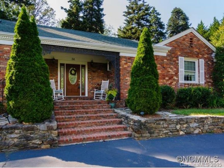 Location, lot & landscape! North Asheville single level home a short stroll from Beaver Lake on the greenway. Hardwoods in main living areas with gas fireplace. Large kitchen. Nice den with wood stove (could be 3rd bed) opens to awesome covered back patio with hot tub & 2 level beautifully landscaped back yard. Fenced run around outbuilding. Newer heat pump/furnace, solar hot water w/electric backup and 7 year old roof. Tons of potential!!