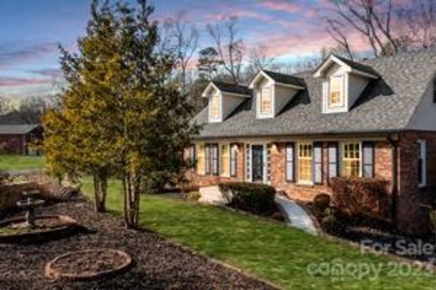 ***Offering $2,000 in Seller Paid Closing Cost *** Spacious Custom built home welcomes you from the premier corner lot.  A large showcase window lets the sun shine in through out an open floor plan. This home boast of 4 Br 3.5 Ba, breakfast and dining area. Enjoy a large partially finished basement area.  In the kitchen Cabinet space abounds with granite counter tops and newly updated appliances.  Just off the kitchen is an expansive full length back deck. Two primary bedrooms each offering newly renovated ensuites.  The 4th bedroom has its own full bathroom, and can be used as an In-law suite or a loft. New Laminate Wood floors through out with 6" floor molding added. New replacement windows, new 40 year roof, gutters and exterior electrical panels. New doors throughout. Enjoy the privacy that is offered by a tranquil water fountain surrounded by beautiful landscaping just off your entry way.  You have GOT to see this one for yourself.