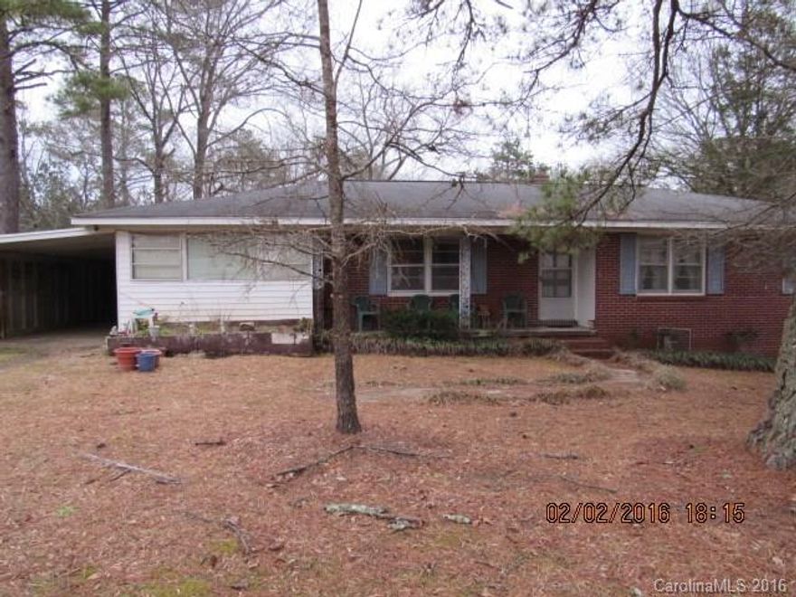 Looking for privacy? This offers 9.6 acres of rolling hills, hardwoods and a small pond, set off to road to enjoy the country living. All brick home offers 3 bedrooms, 2 full baths, dining, living room, large laundry room and a sun room. Older home, but ready for someone to make it their own.