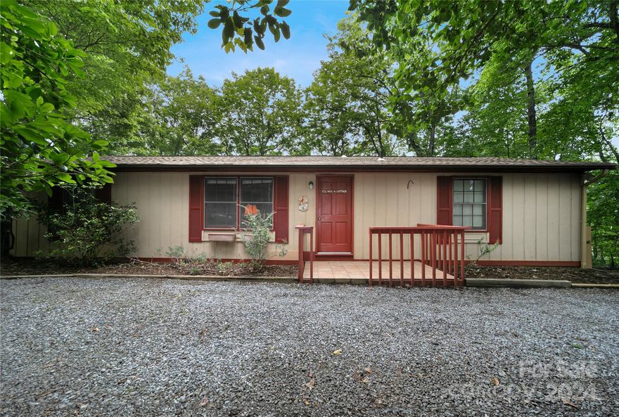 Owners say bring all offers. This 3BR/2BA fixer-upper sits on a beautiful built-out street of only 10 homes in gated Connestee Falls. Laundry room could be 4th BR. Home has great potential.  It offers one-level living w/only one step up into the home. Sitting on .52 acre it offers some year round mountain views that could be opened up with some tree trimming.  There is a large deck, screened porch, circular driveway, new roof in 2023, & it’s on community sewer. Connestee offers approx. 20 miles of pristine hiking w/the Ogana Trail just behind this home.  Conveniently located near the main gate & only 6 miles to downtown Brevard, & between Pisgah National Forest & Dupont State Forest. Connestee is a magical mountain neighborhood of approx. 4,000 acres with waterfalls, 4 beautiful lakes, & amenities including a spectacular 18-hole golf course, swimming pool, tennis and pickle ball courts, fitness center, restaurants & lounge, many activity clubs, & much more.  Seller financing available.